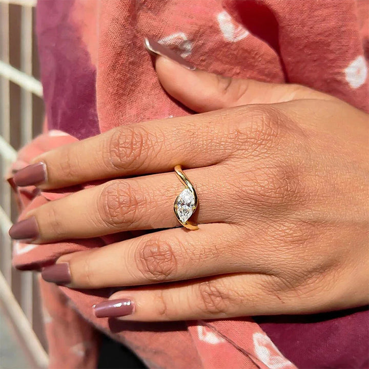 Marquise-cut twisted ring