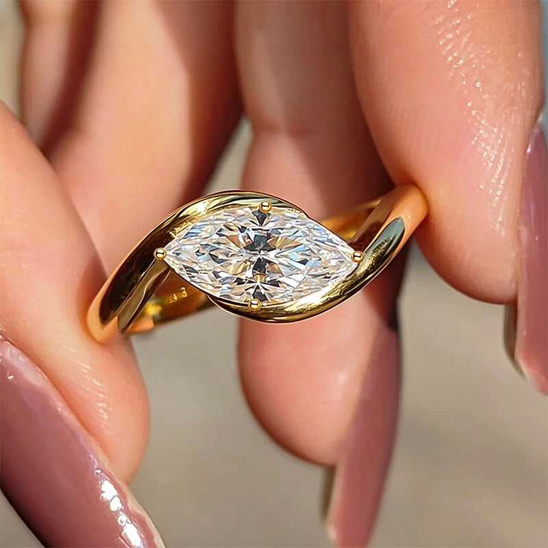Marquise-cut twisted ring